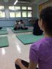 Students are having a Yoga Class.