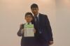 Tam Pak You (1B) was awarded the First Position in S.1 by the Principal.