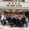 A group photo is taken outside the High Court after the competition.