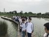 Students and teachers are exploring the nature in the Mai Po Nature Reserve.