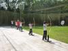 Students are playing archery and competing with each other.