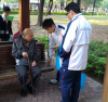 Students are trying to understand the needs of the elderly through the interview.