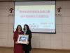 Miss Leung, our Assistant Principal, presents a souvenir to Principal Wu at Ning Bo No. 15 Middle School.