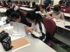 Students were working on the pre-test before the AR Sandbox lecture.