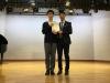 Huang Jie Hao from class 3A was awarded the First Position in S.3 by the Principal.