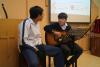 Our students were playing music to the children.