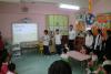Our students were teaching the children simple English.