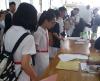 Students registered at the counter before the competition.