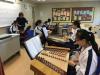 Students are practising Zheng together.