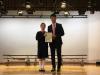 Wong Ho Long from class 2E was awarded the First Position in S.2 by the Principal.