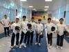 Students dress up for their unique experience in the fencing class. They all look great!