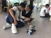Students are doing a trial in testing their LEGO car before doing the task.