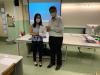 Mr. Yeung presents a souvenir to the representative from BOC(HK) volunteer team.
