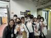 Students take a group picture at Feeding Hong Kong.