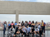 Students take a group photo at Nansha Port Phase IV Fully Automatic Terminal.