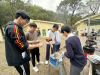 With the assistance of social workers, students put their heads together to prepare a delicious barbecue meal, learning valuable life skills and receiving mentorship during their outdoor adventure.