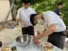 Students attempting to make their own sandwiches