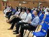 The principal and teachers listen to the sharing of the Committee Heads.