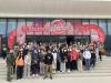 All staff members take a group photo in front of the Zhuhai Zhuhai Aerospace Land.