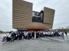 A group photo of all teachers and students in front of the Hong Kong Palace Museum