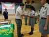 The Scout Team Sectional Scout Leader (Mr. Chow Man Chung) was presenting the First Aid Badge to 3E Yeung Ching.